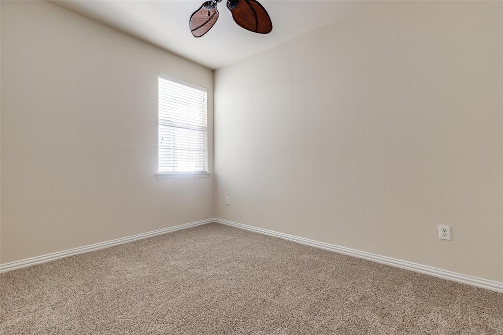 2836 Fordham Road Plano, TX 75025 - Photo 12 of 18 an empty room with windows and fan