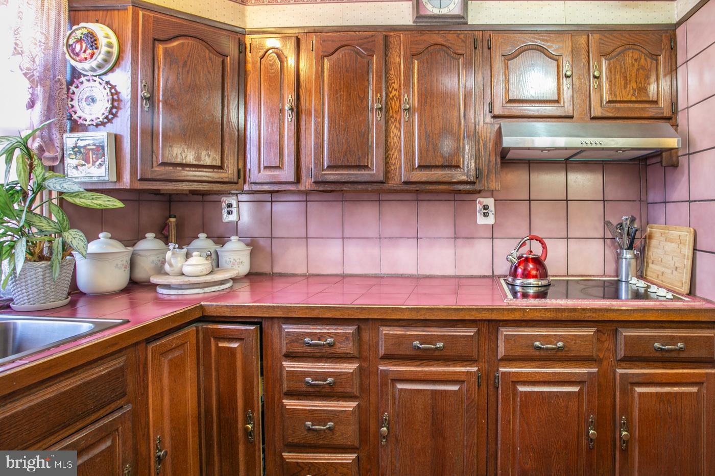 1144 Slocum Street Philadelphia, PA 19150 - Photo 12 of 27 a kitchen with stainless steel appliances granite countertop a sink and cabinets