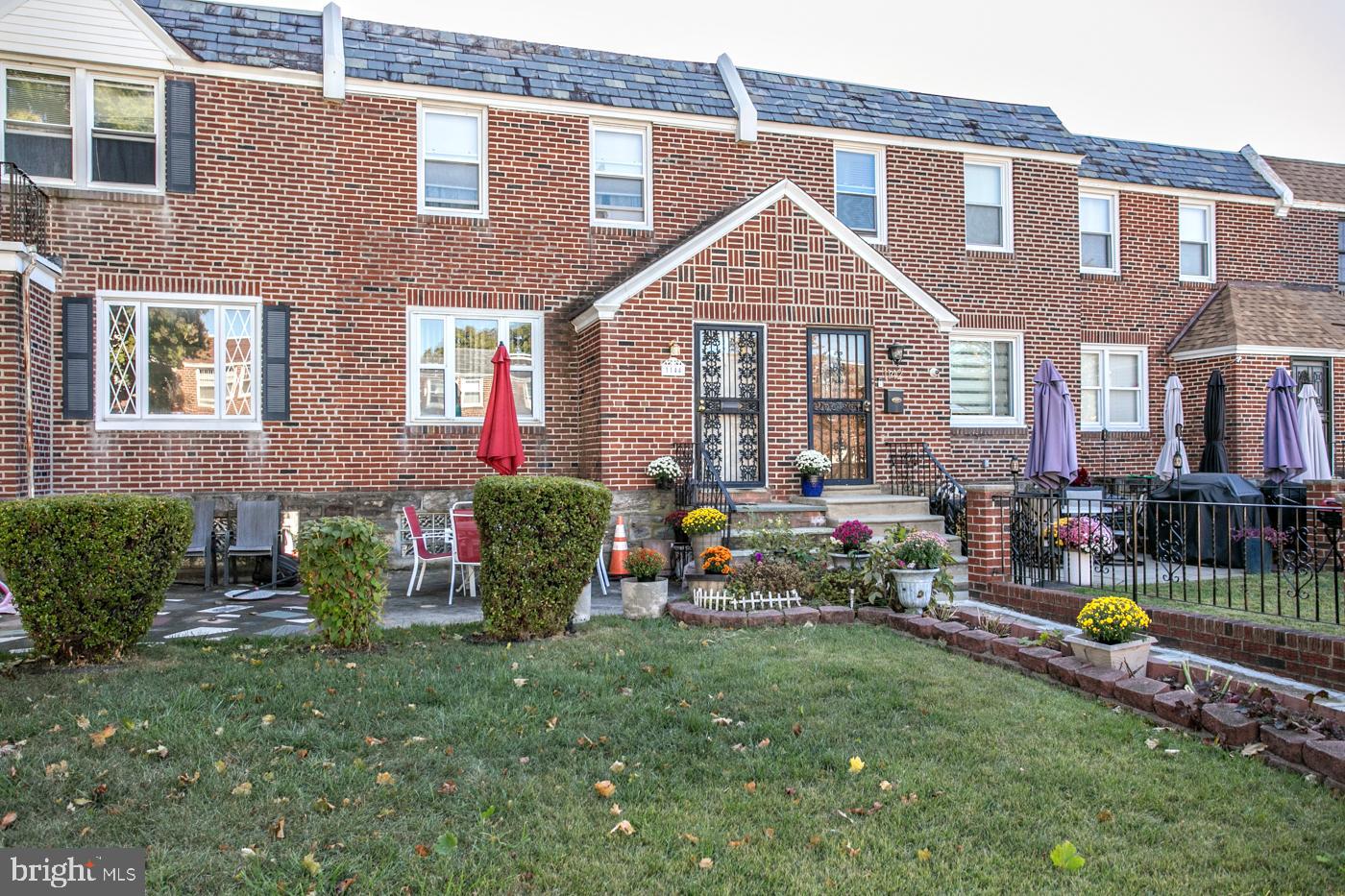 1144 Slocum Street Philadelphia, PA 19150 - Photo 2 of 27 a front view of a house with patio