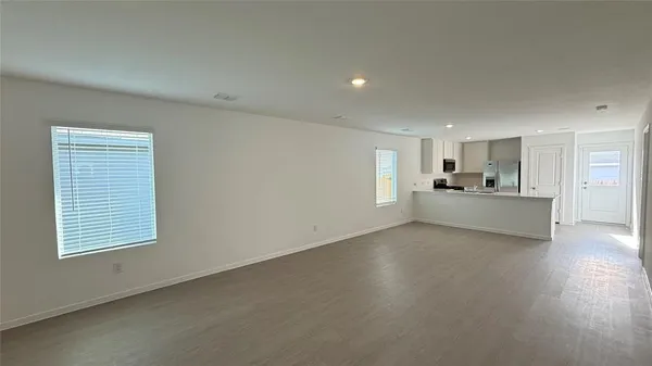 a view of a kitchen with a sink cabinets and a window