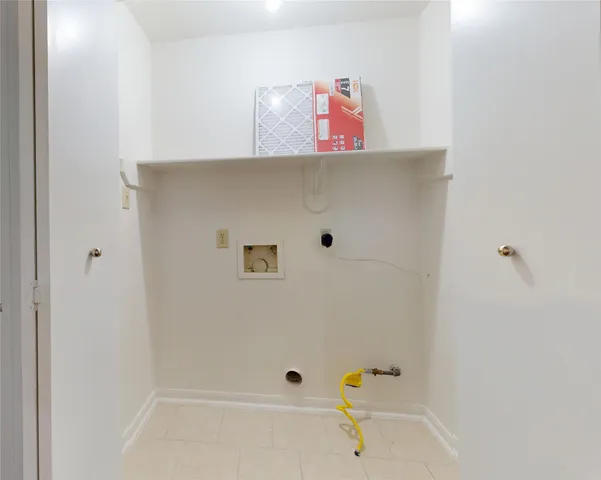 a bathroom with a tub and shower