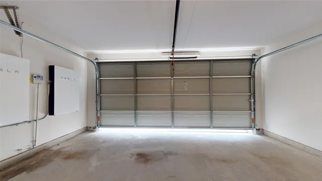 a view of an empty room with a fireplace