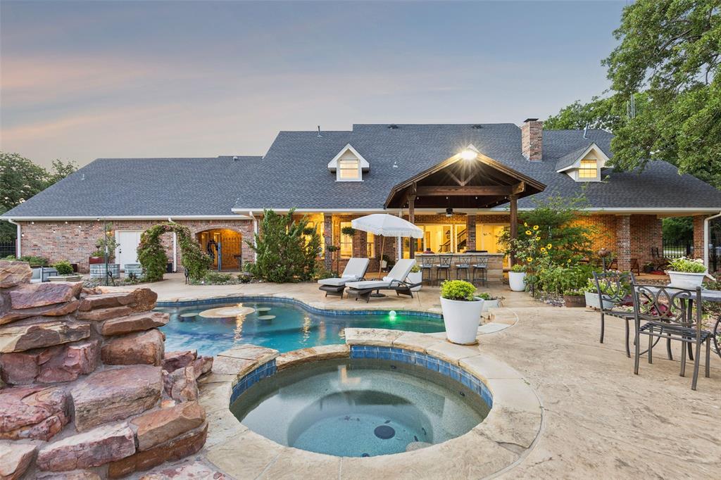 12630 Merrill Road Pilot Point, TX 76258 - Photo 16 of 39 Pool, spa, fire pit and built in grill.