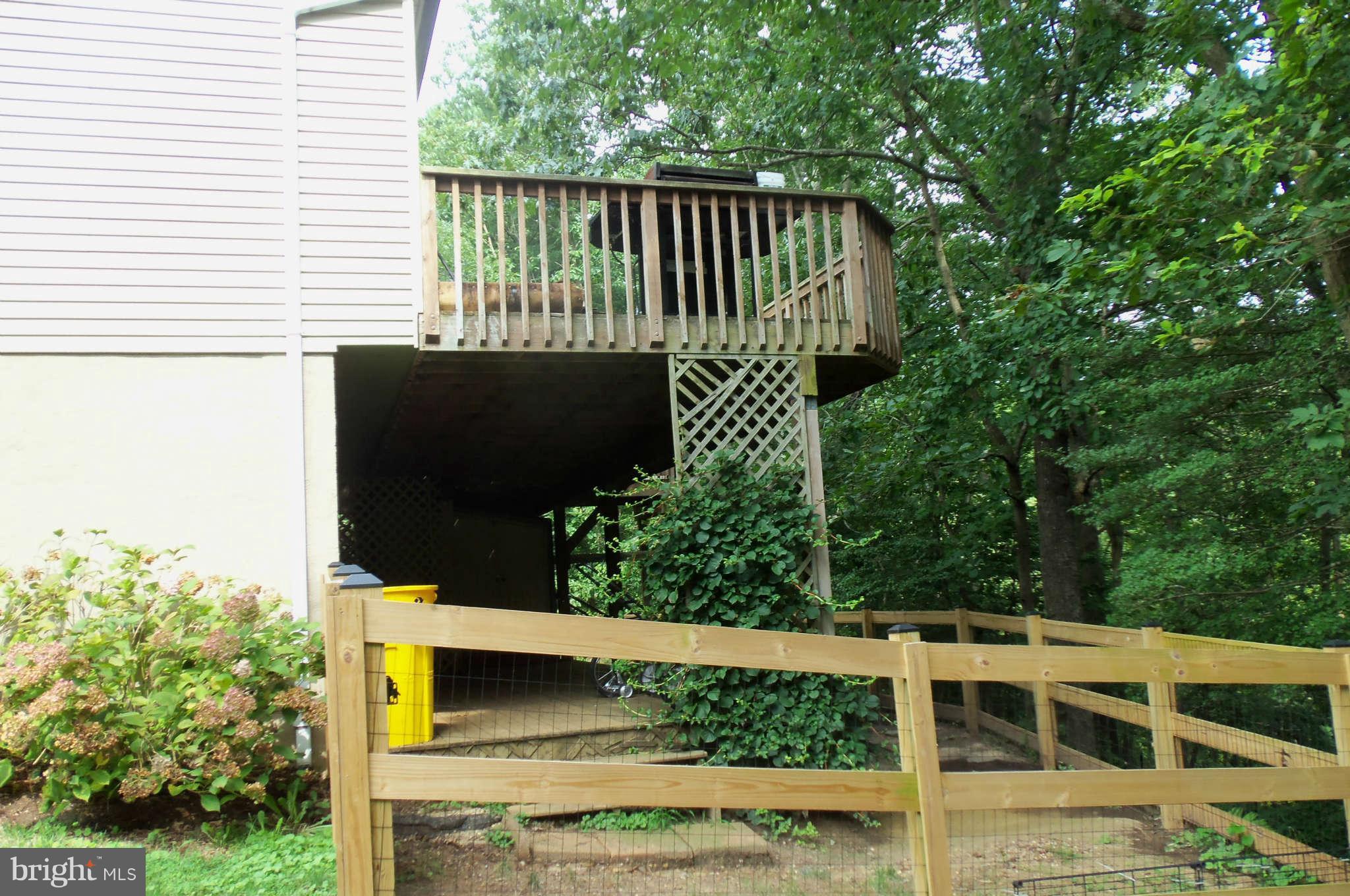 271 Silverleaf Court Arnold, MD 21012 - Photo 18 of 19 a view of a chair and table in the backyard