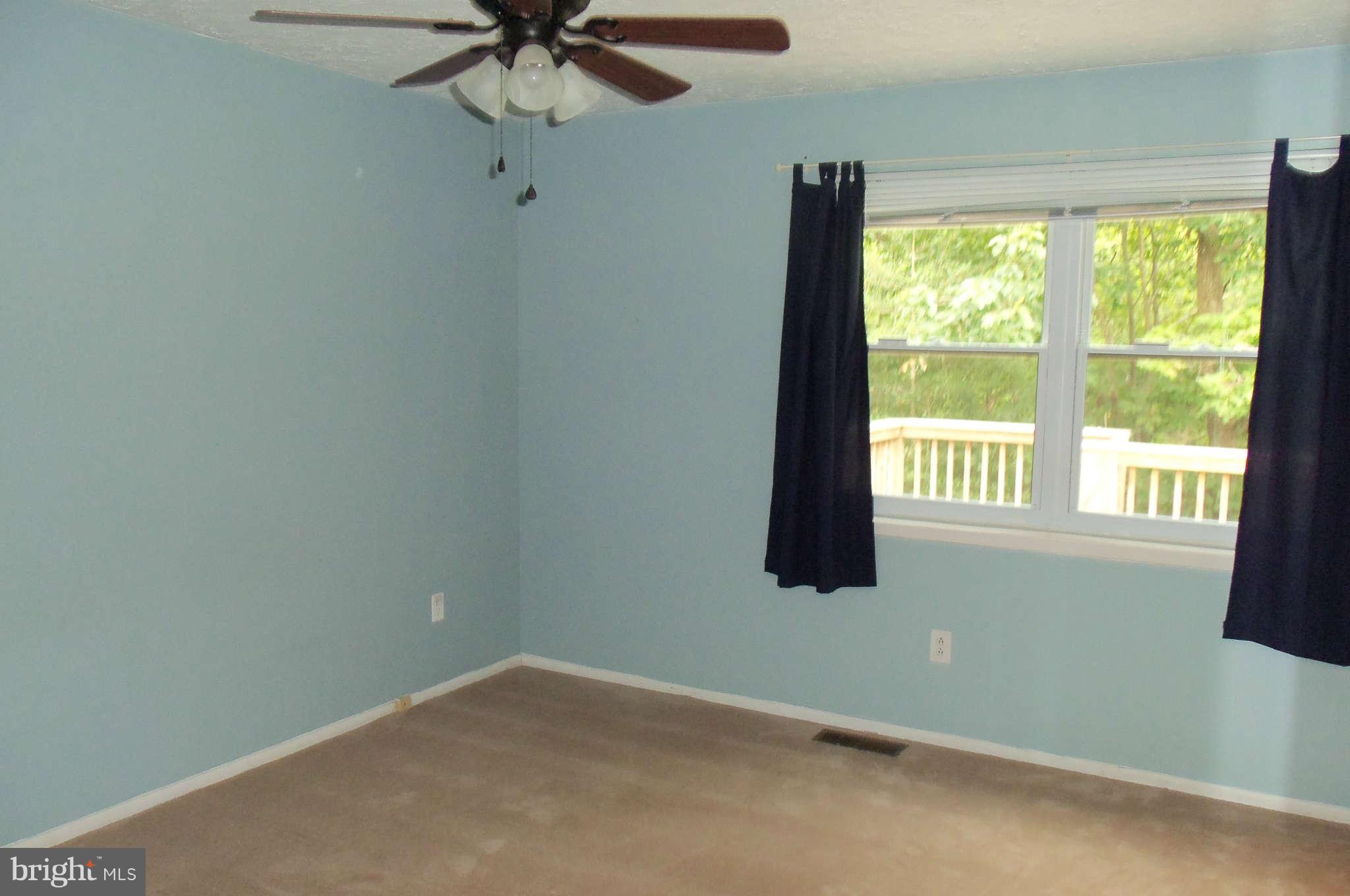 271 Silverleaf Court Arnold, MD 21012 - Photo 7 of 19 an empty room with a window