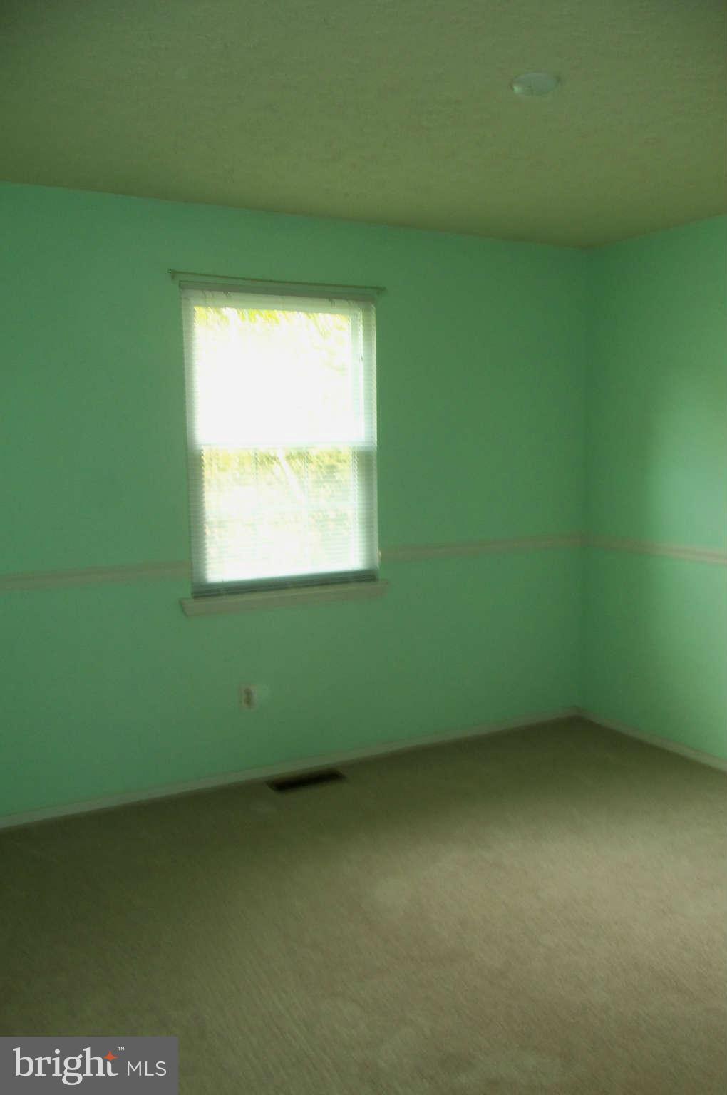 271 Silverleaf Court Arnold, MD 21012 - Photo 10 of 19 a view of an empty room with a window