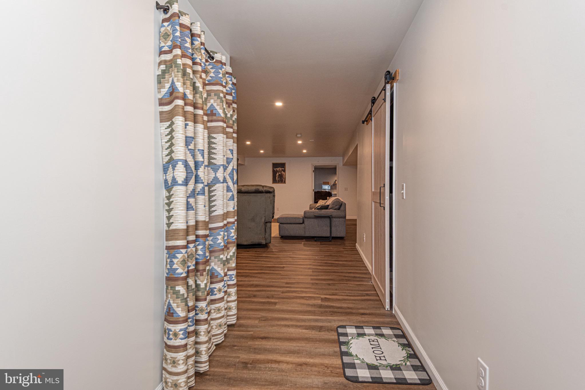 242 Hayden Road Centreville, MD 21617 - Photo 27 of 40 Basement Hallway