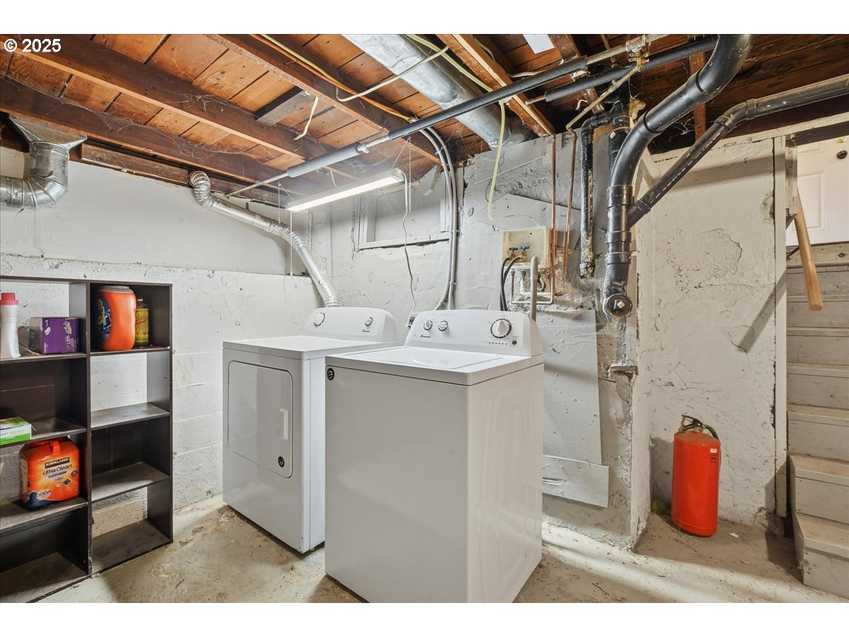 8813 Northeast Ward Street Portland, OR 97220 - Photo 14 of 32 a utility room with a washer and dryer