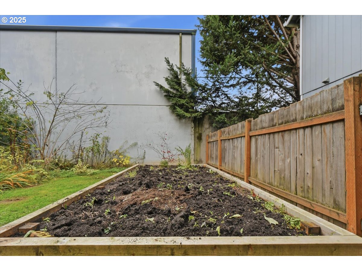 8813 Northeast Ward Street Portland, OR 97220 - Photo 19 of 32 a view of a backyard