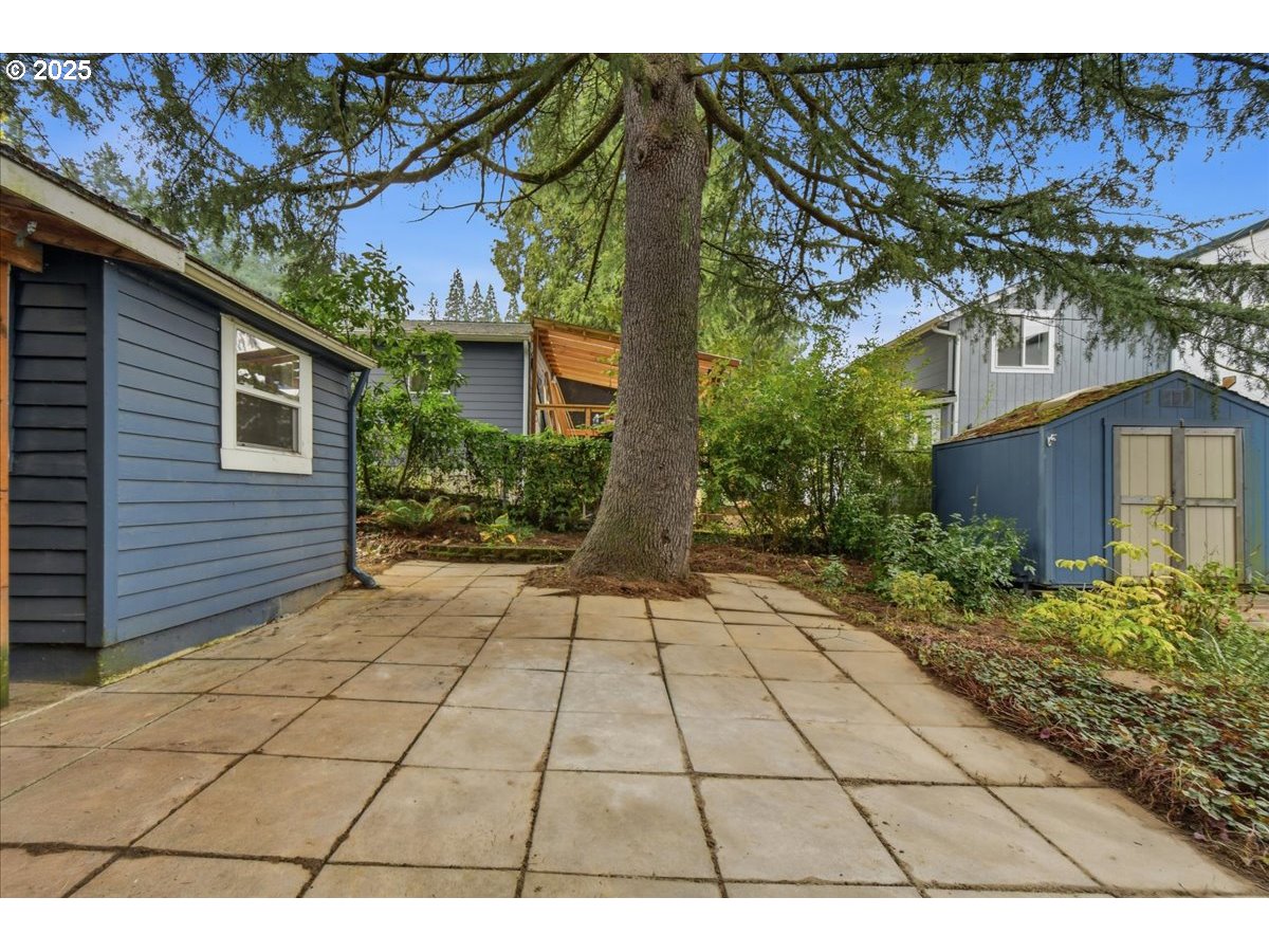 8813 Northeast Ward Street Portland, OR 97220 - Photo 24 of 32 a view of backyard with a garden and plants