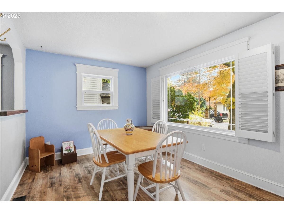 8813 Northeast Ward Street Portland, OR 97220 - Photo 7 of 32 a dining room with furniture and a window