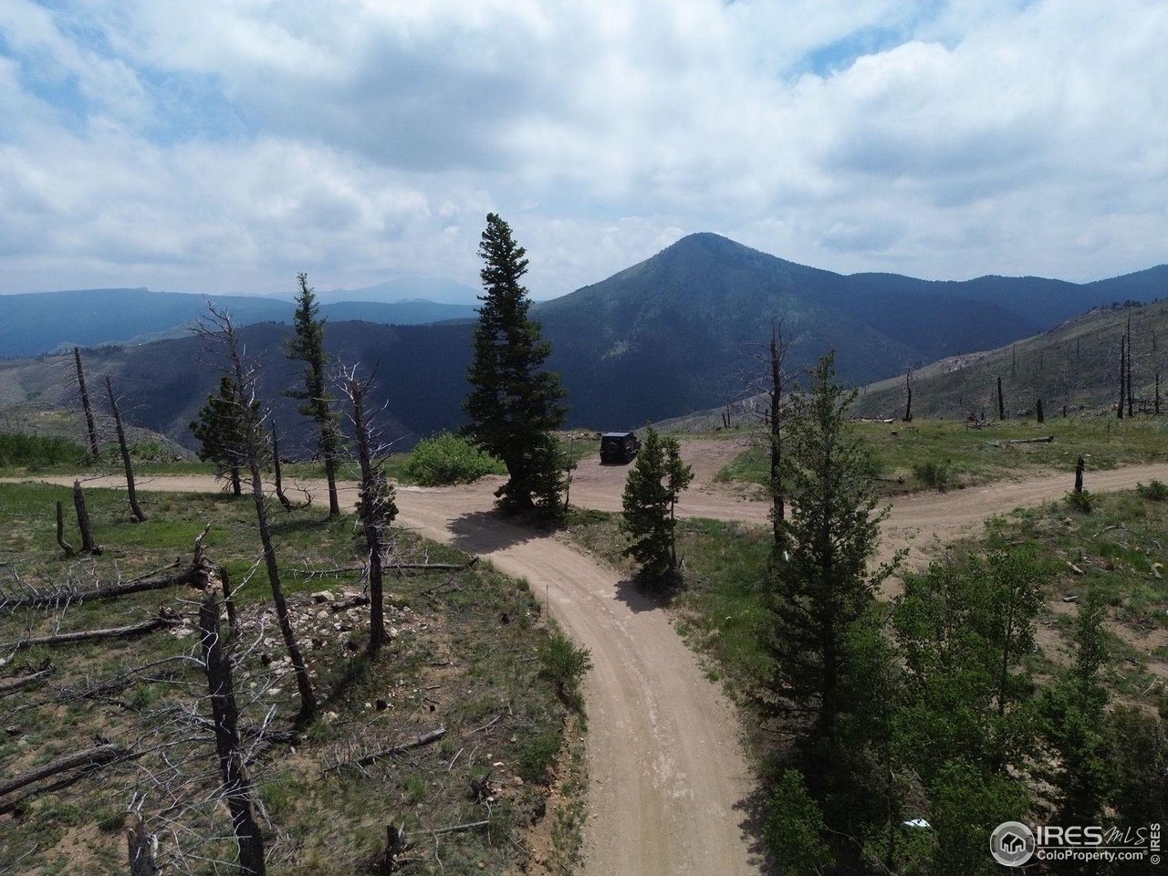 a view of a city with a building in the background