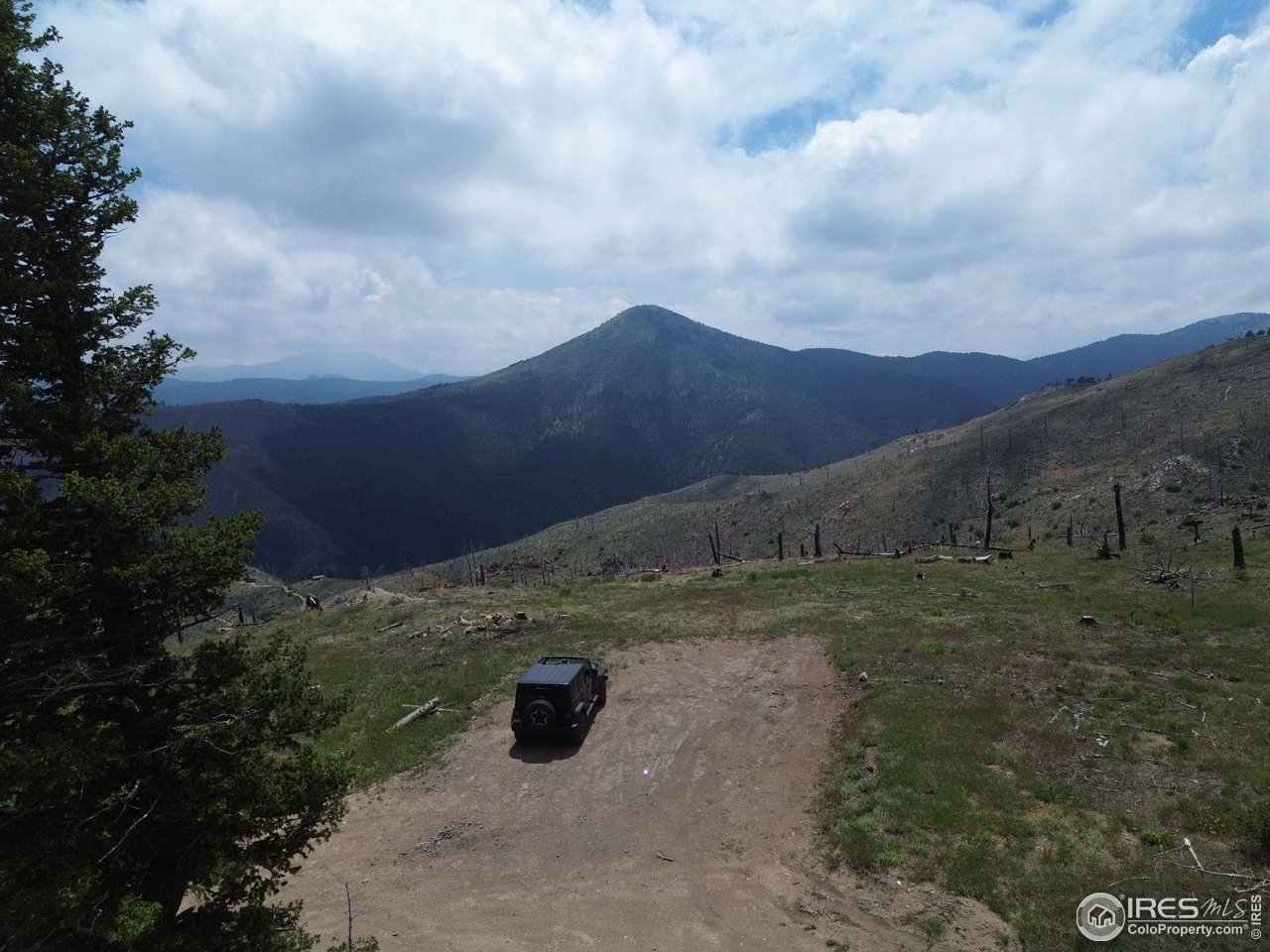 280 Rim Road Boulder, CO 80302 - Photo 2 of 29 a view of an outdoor space and mountain