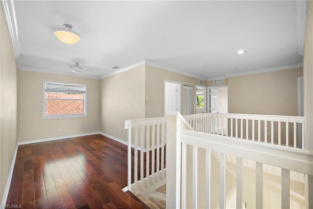 8542 Sumner Avenue, Unit 1 Fort Myers, FL 33908 - Photo 10 of 18 a view of hallway with porch and wooden floor