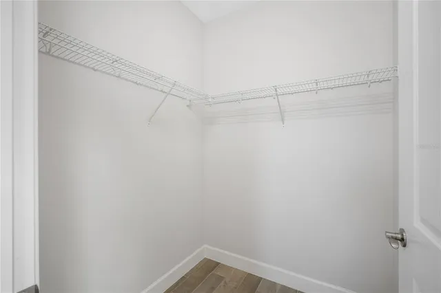 a view of a room with racks on the wall