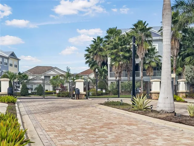 a view of a street with a building in the background