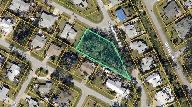 Chestnut Road Venice, FL 34293 - Photo 2 of 4 an aerial view of a residential apartment building with a yard