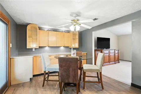 a view of a livingroom with an empty space and a window