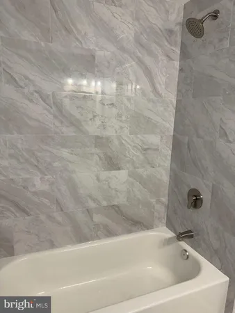 a bathroom with a bathtub