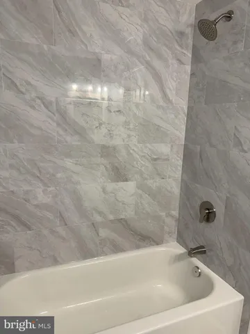 a bathroom with a bathtub