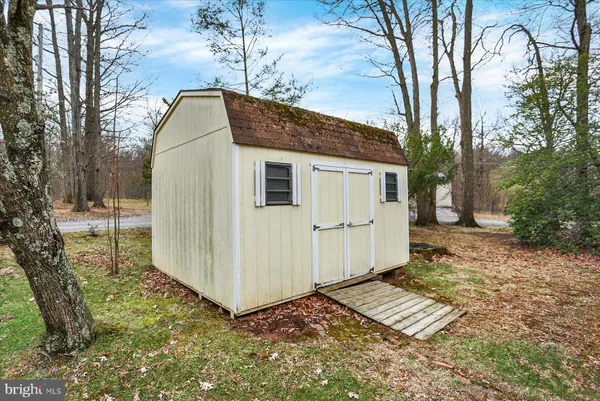 a house with trees in front of it