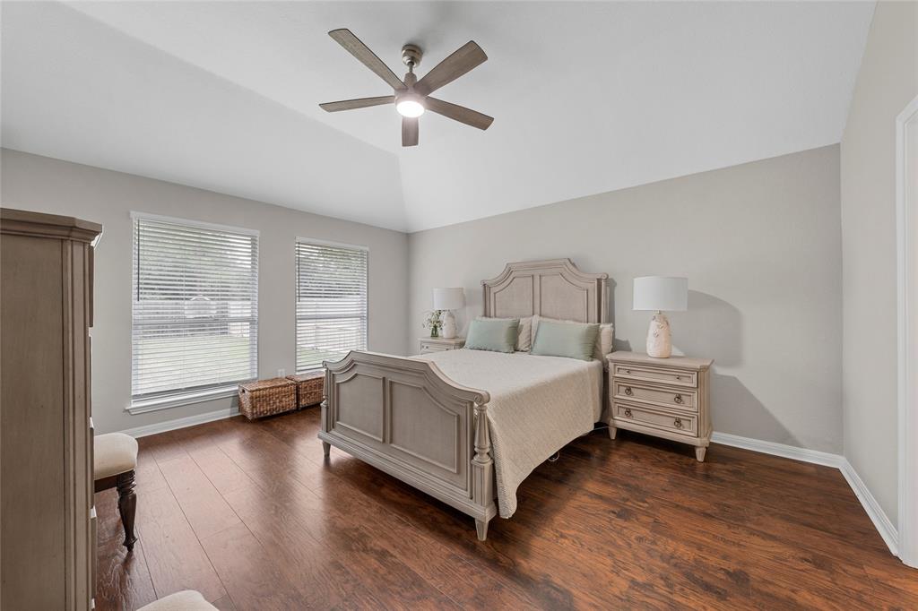 10124 Bunting Drive Waco, TX 76708 - Photo 15 of 18 a bedroom with a bed and a large window