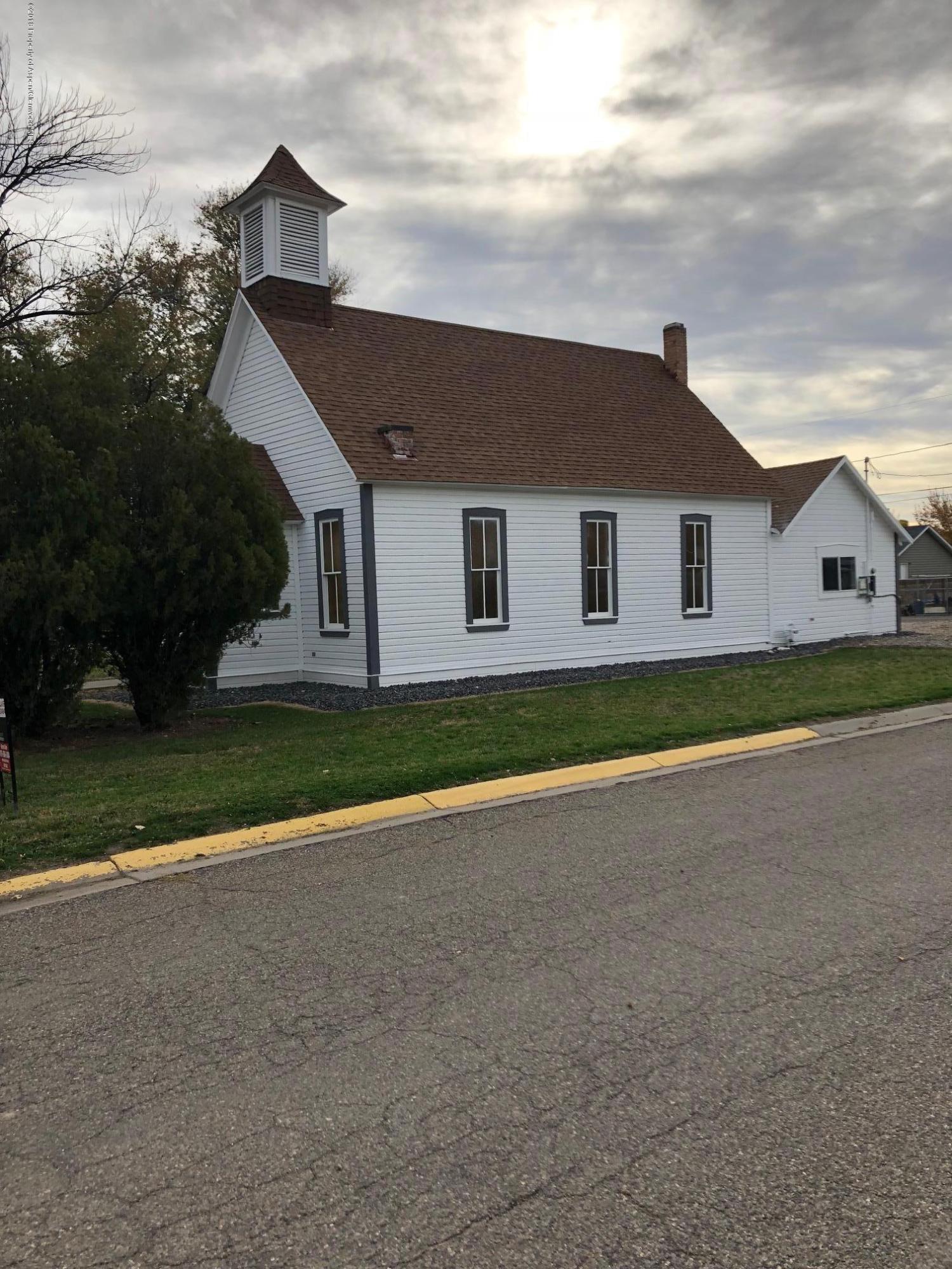 a house with yard in front of it