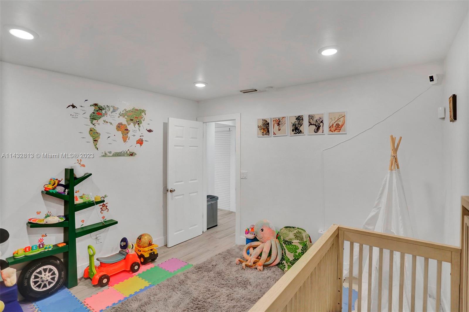 20429 Northeast 10th Ct Road Miami, FL 33179 - Photo 20 of 42 a view of kids room with toys