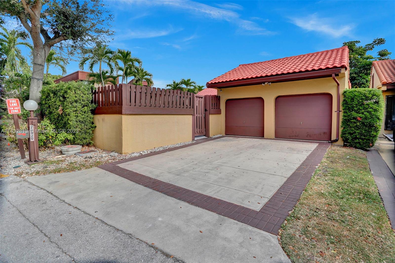 20429 Northeast 10th Ct Road Miami, FL 33179 - Photo 2 of 42 a view of a house with a yard