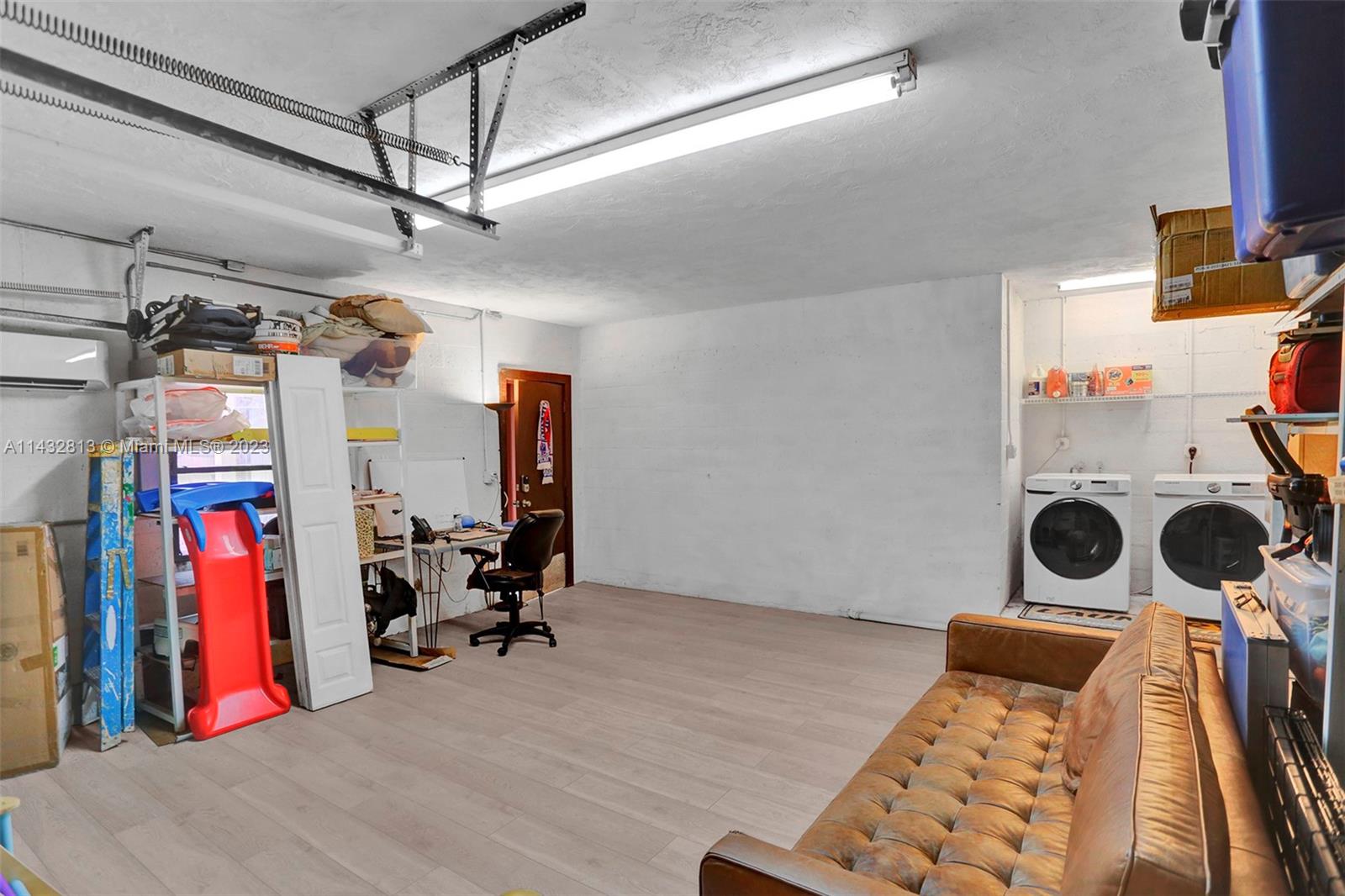 20429 Northeast 10th Ct Road Miami, FL 33179 - Photo 34 of 42 a view of a room with gym equipment