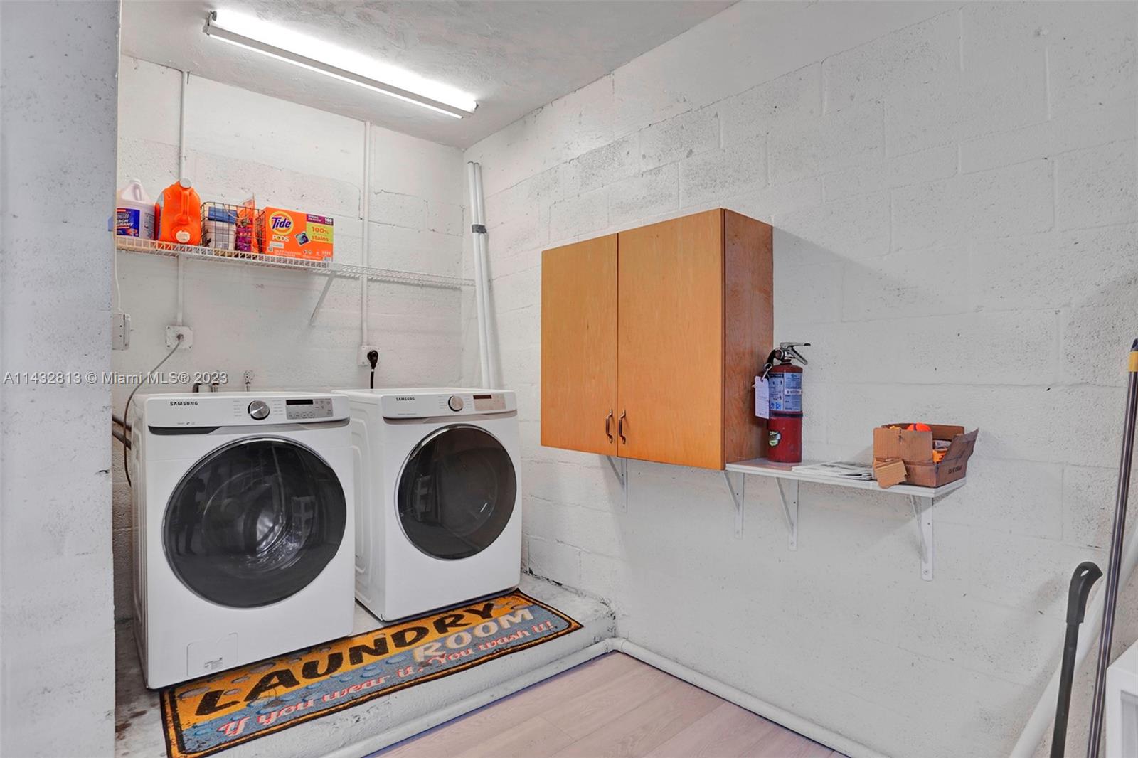 20429 Northeast 10th Ct Road Miami, FL 33179 - Photo 35 of 42 a utility room with dryer and washer
