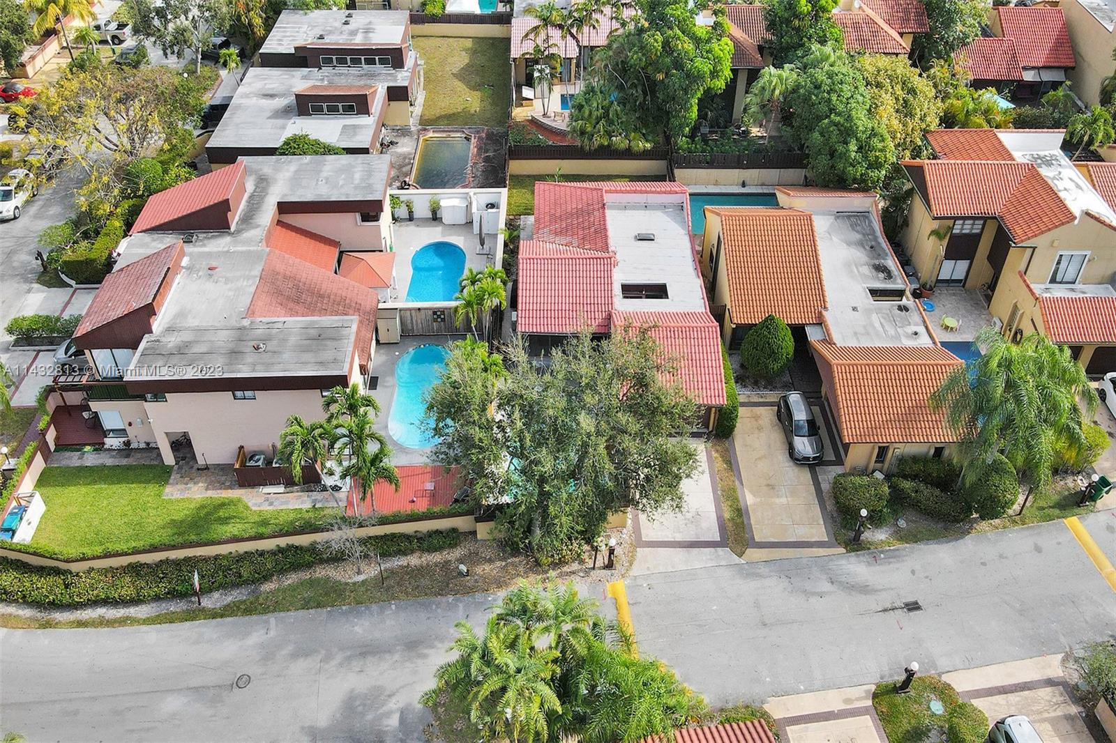 20429 Northeast 10th Ct Road Miami, FL 33179 - Photo 36 of 42 an aerial view of residential houses with outdoor space and trees all around