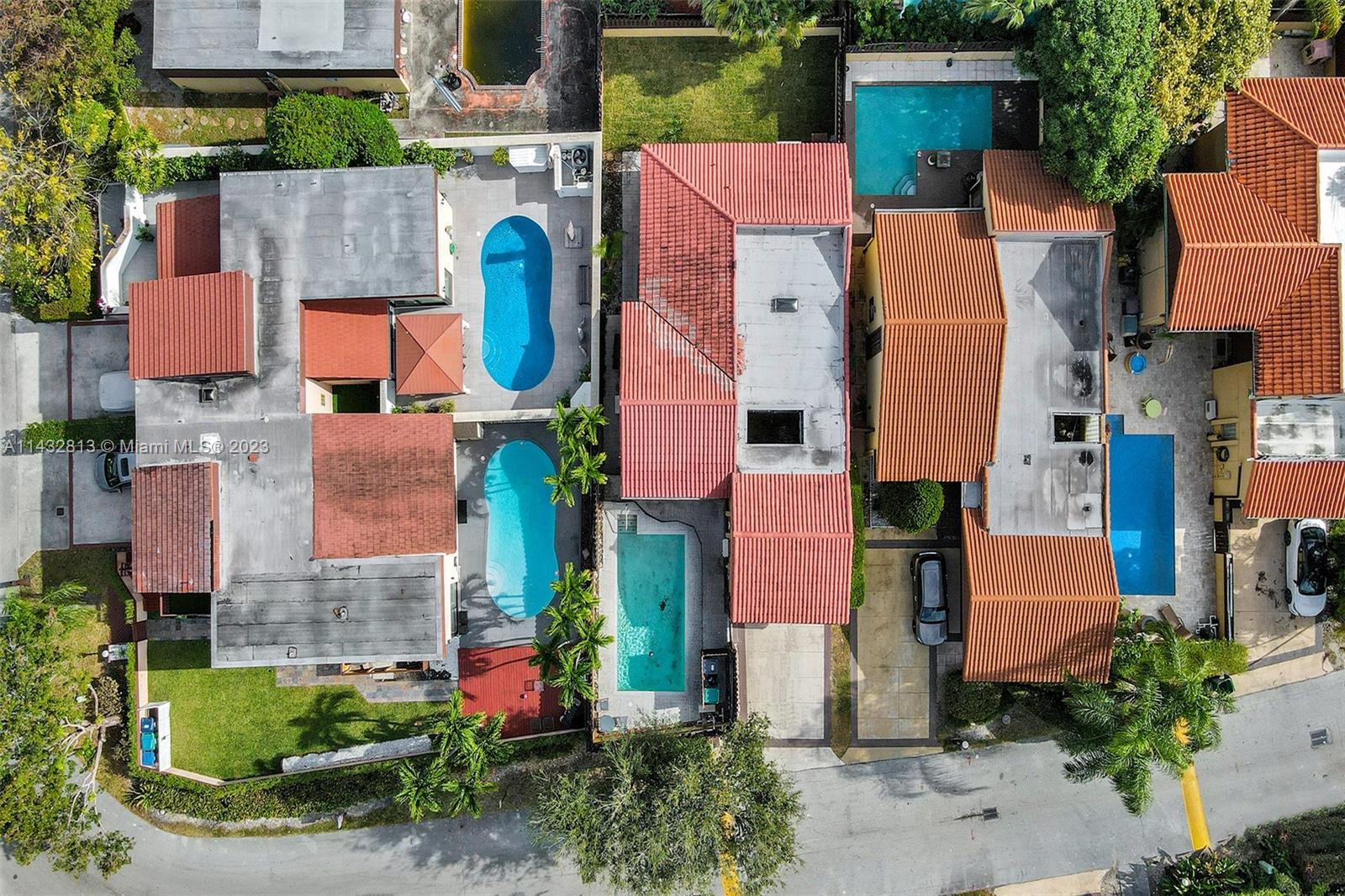 20429 Northeast 10th Ct Road Miami, FL 33179 - Photo 42 of 42 an aerial view of residential houses with outdoor space and parking