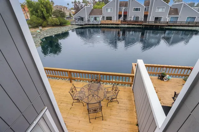 a view of a lake from a balcony