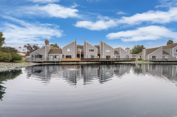 a view of a lake with houses