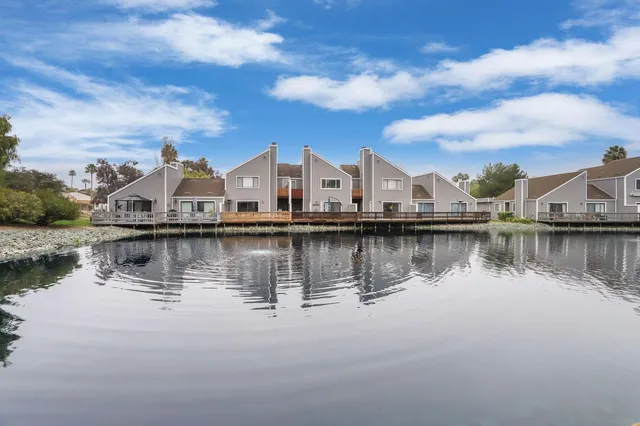 a view of a lake with houses