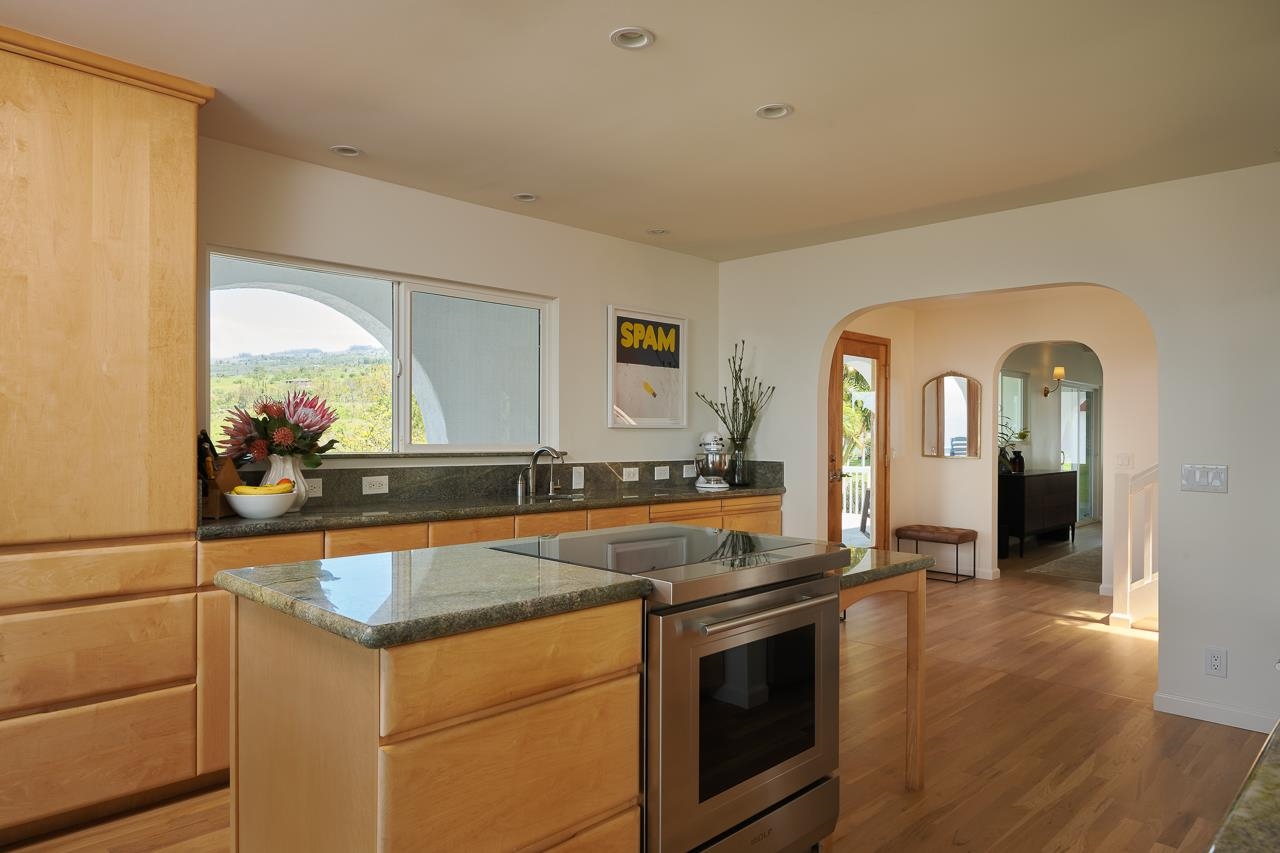 Undisclosed Address Kula, HI 96790 - Photo 11 of 50 a view of a kitchen with stainless steel appliances granite countertop a sink and cabinets
