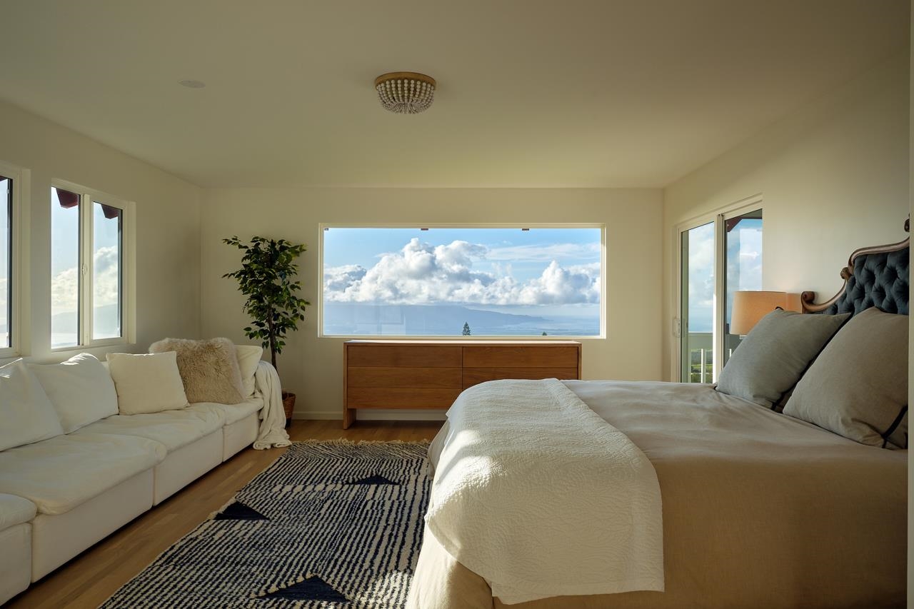 Undisclosed Address Kula, HI 96790 - Photo 18 of 50 a living room with furniture and a large window