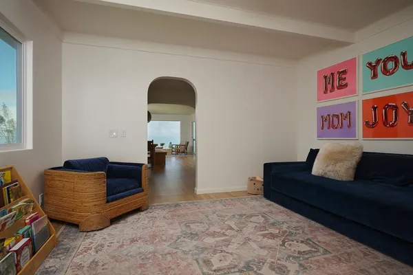 a living room with furniture and a couch