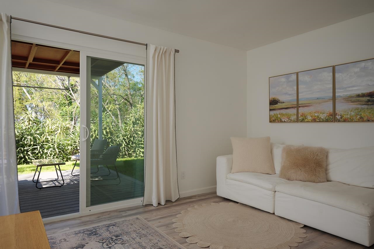 Undisclosed Address Kula, HI 96790 - Photo 32 of 50 a living room with furniture and a window