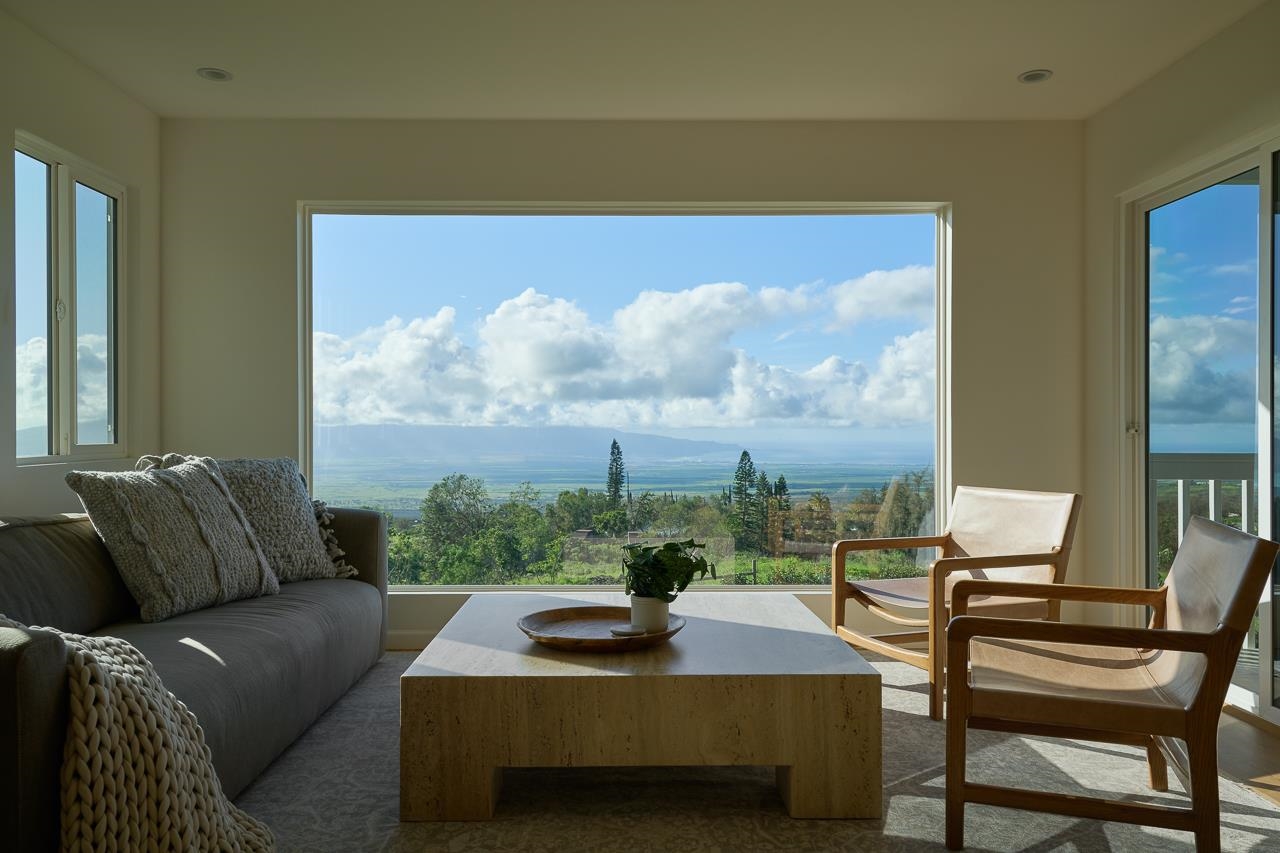 Undisclosed Address Kula, HI 96790 - Photo 42 of 50 a living room with furniture and a floor to ceiling window