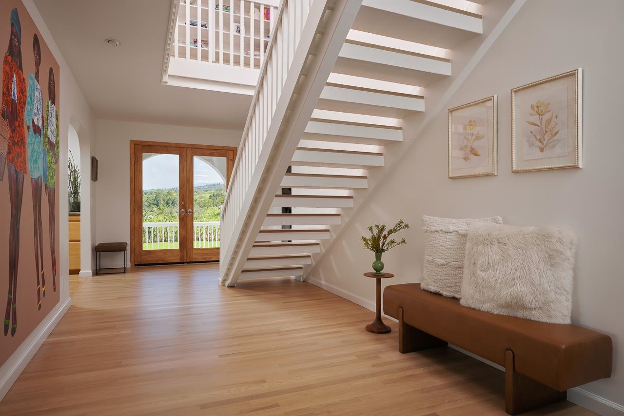 Undisclosed Address Kula, HI 96790 - Photo 7 of 50 a view of entryway with stairs and wooden floor