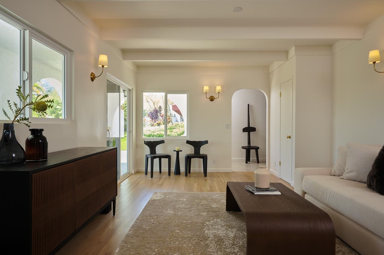 Undisclosed Address Kula, HI 96790 - Photo 9 of 50 a living room with furniture a dining table and a potted plant