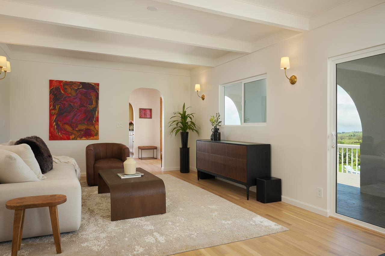 Undisclosed Address Kula, HI 96790 - Photo 10 of 50 a living room with furniture and a flat screen tv