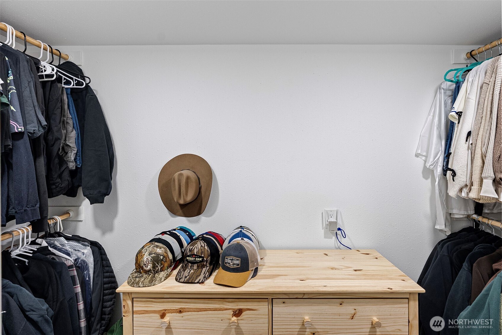 721 East McMickin Road Shelton, WA 98584 - Photo 17 of 38 a view of walk in closet with clothes and shoes