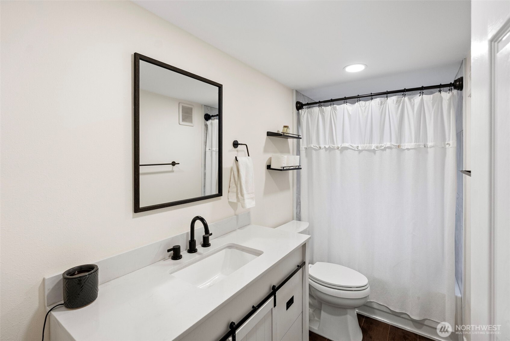 721 East McMickin Road Shelton, WA 98584 - Photo 20 of 38 a bathroom with a sink a toilet and shower