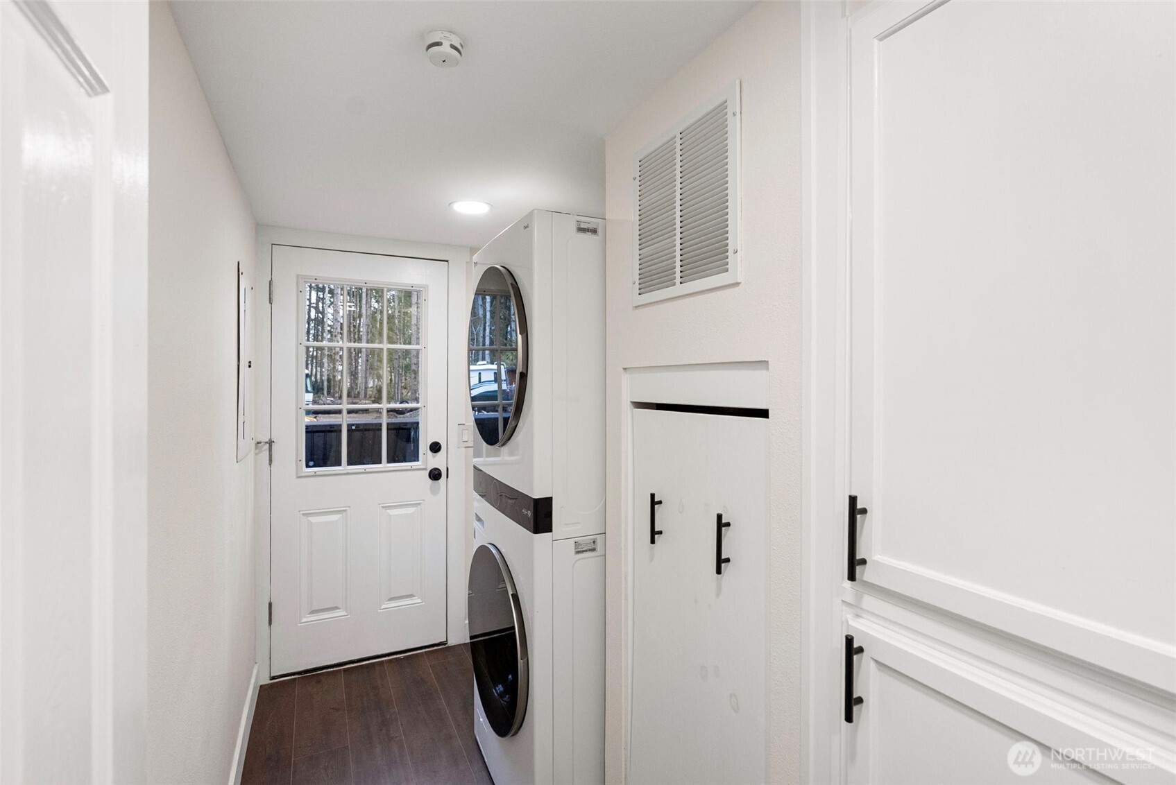721 East McMickin Road Shelton, WA 98584 - Photo 21 of 38 a view of a hallway with washer and dryer