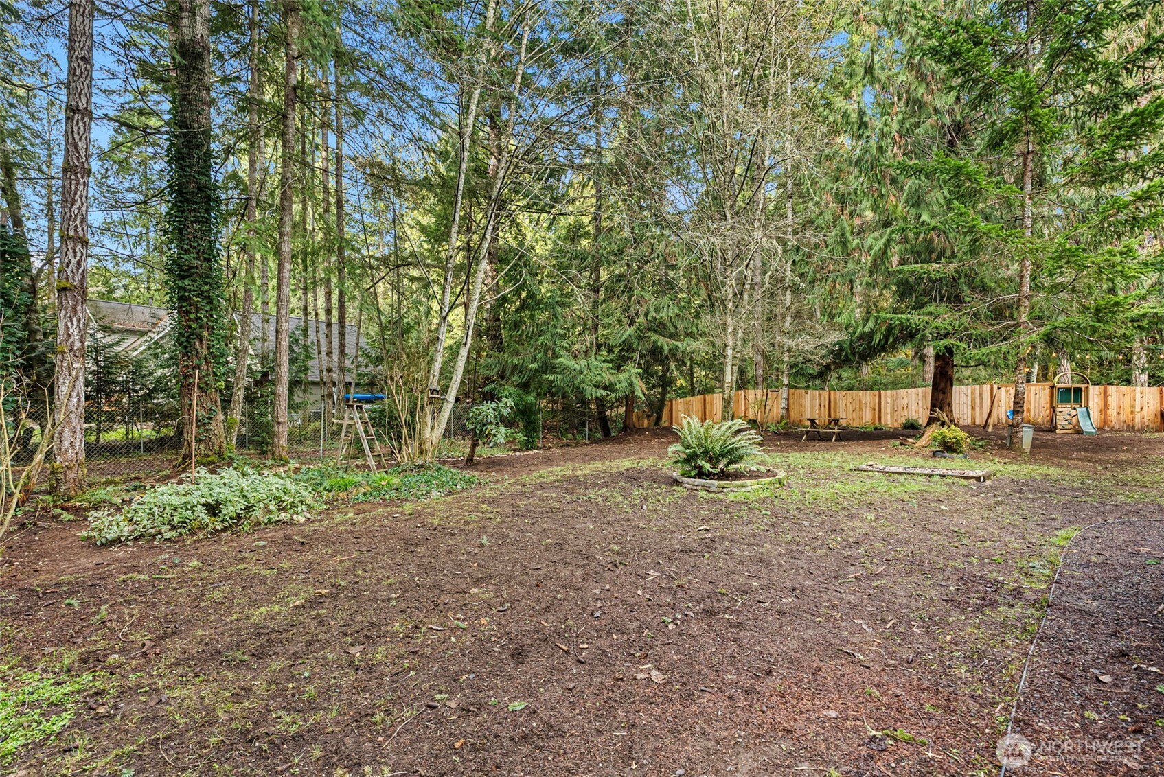 721 East McMickin Road Shelton, WA 98584 - Photo 27 of 38 a view of a yard with a tree