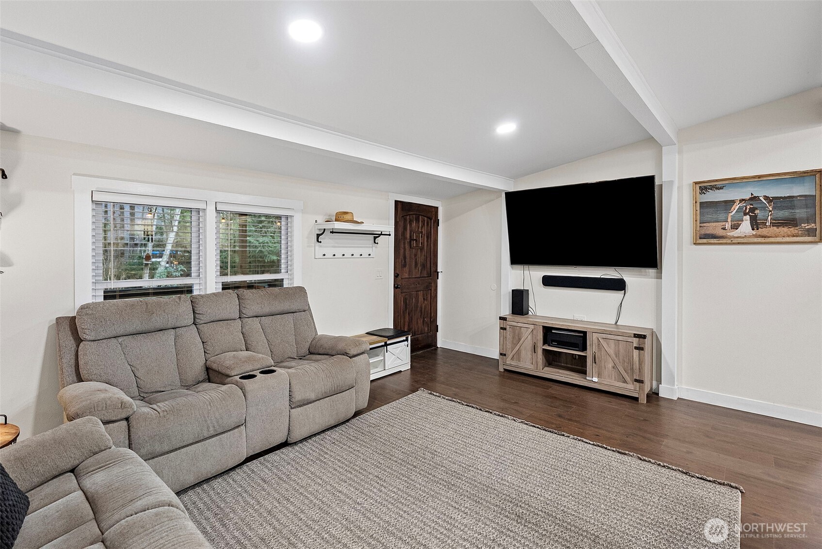 721 East McMickin Road Shelton, WA 98584 - Photo 6 of 38 a living room with furniture and a flat screen tv