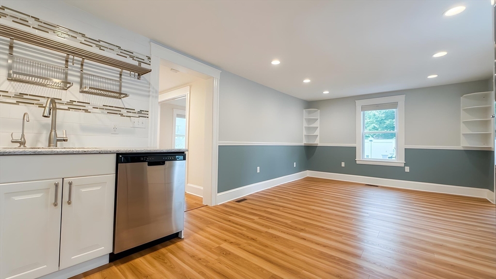 114 Curve Street Dedham, MA 02026 - Photo 8 of 27 a view of empty room with wooden floor and fan